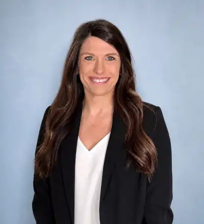 Image of a woman wearing a black blazer